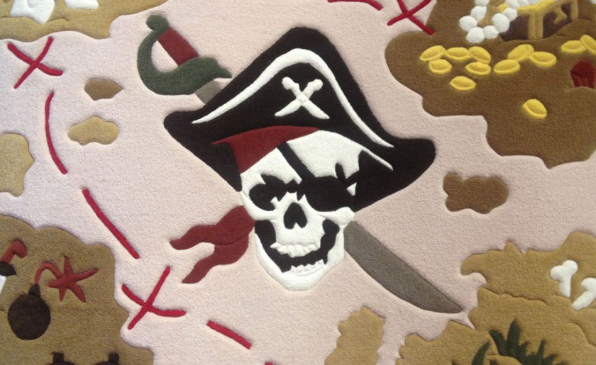 Skull & treasure chest detail on rug