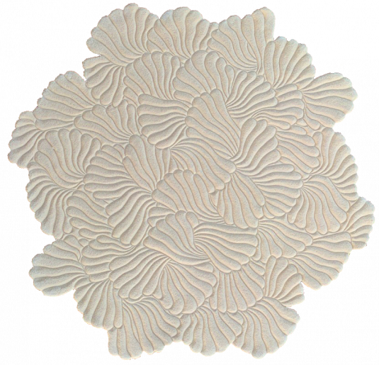 Beige round carpet marshmallow. The finest craftsmanship in carpet shearing.