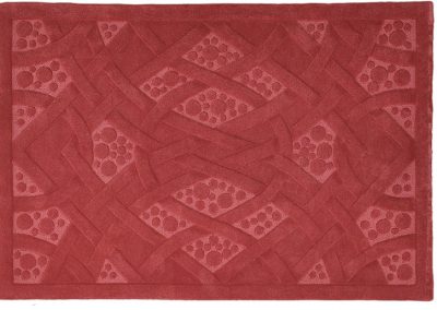 3D sculpted Celtic rug in terracotta made from British wool