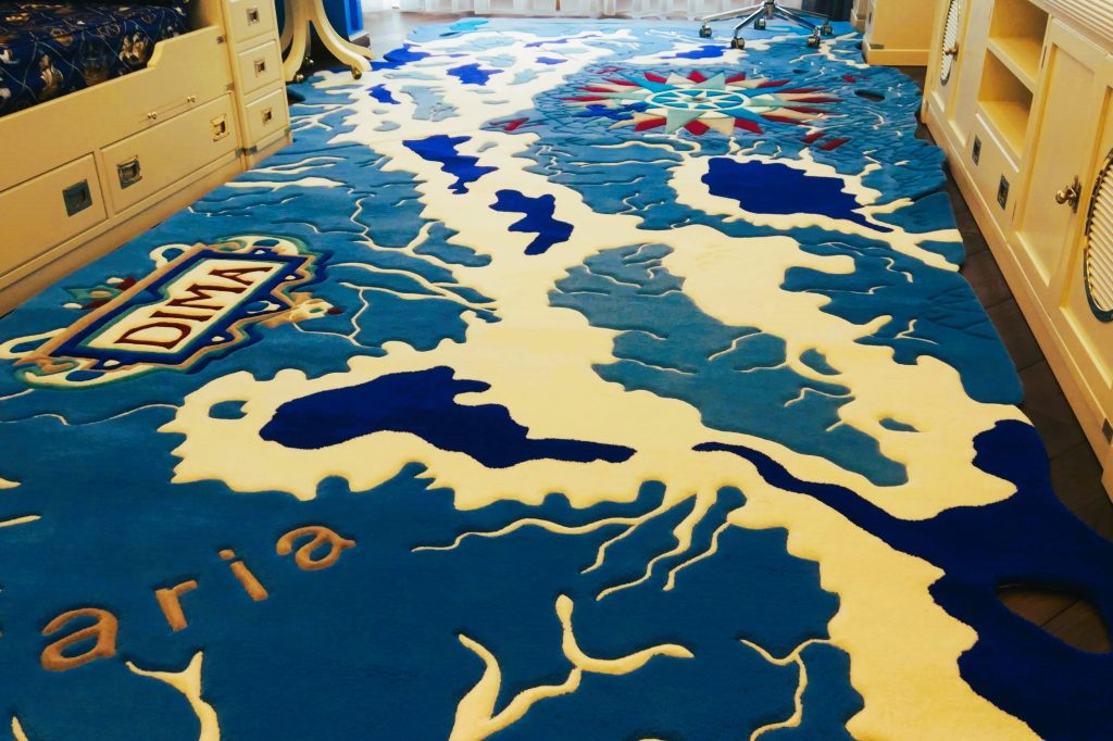 Children’s nautical rug with compass and vintage map design