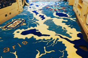 Children’s nautical rug with compass and vintage map design