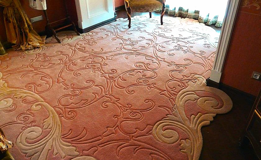 Sculpted wool carpet flowing into a bay window area