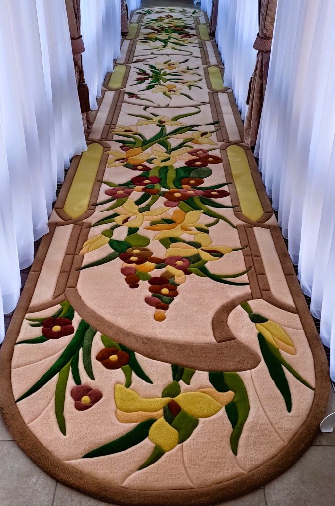 Long rug in hallway with floral ornament